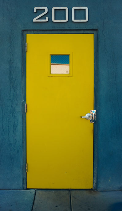 a yellow door with number 200